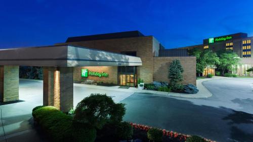 a building with a sign on the front of it at Holiday Inn Cincinnati Airport by IHG in Erlanger