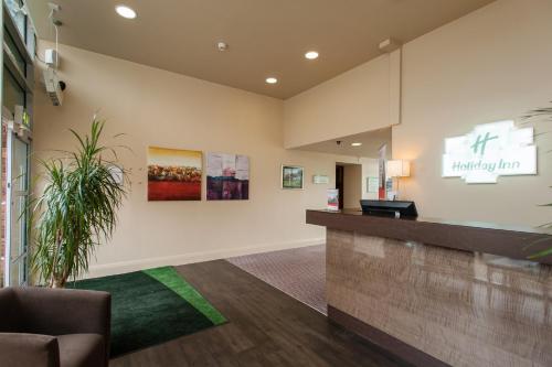 a lobby of a hospital with a waiting room at Holiday Inn Dumfries by IHG in Dumfries