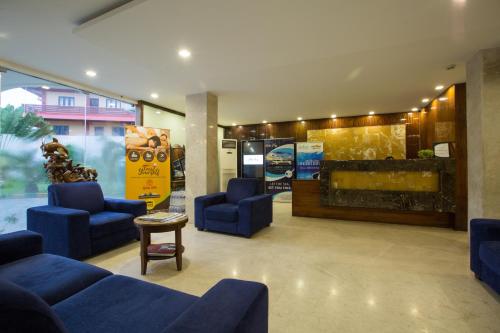Un lugar para sentarse en Hotel TSG Grand