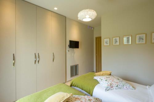 Ένα ή περισσότερα κρεβάτια σε δωμάτιο στο Almyra Villas
