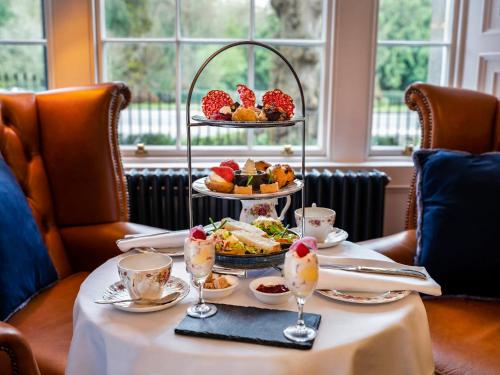 a table with a tray of food on a table at Avalon House Hotel in Castlecomer