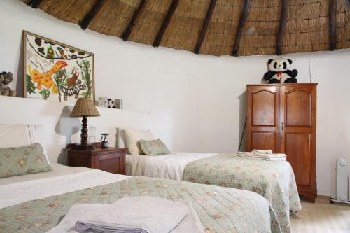 Ένα ή περισσότερα κρεβάτια σε δωμάτιο στο Baldinnie Cottages