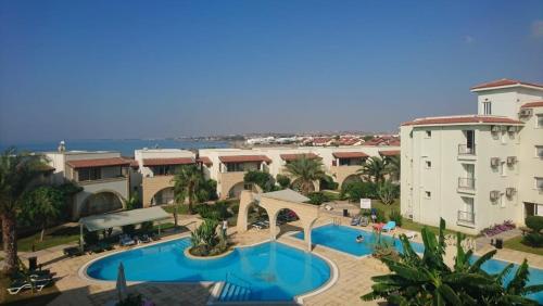 an aerial view of a resort with a swimming pool at Sapphire L44 in Iskele