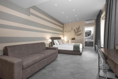 Posezení v ubytování VIVERONE LAKE ROOMS