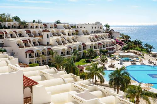 an aerial view of the hotel and the ocean at Movenpick Resort Sharm El Sheikh in Sharm El Sheikh