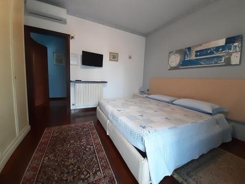 Postel nebo postele na pokoji v ubytování Le 3 Camelie Malpensa