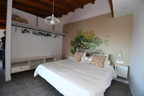 Llit o llits en una habitació de Alojamiento vacacional Linaje del Pago
