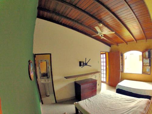 Ένα ή περισσότερα κρεβάτια σε δωμάτιο στο Recanto dos Katzen