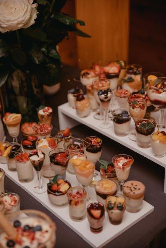 a display of dessert dishes on white plates at Viesu nams RŪĶĪŠI in Rugāji