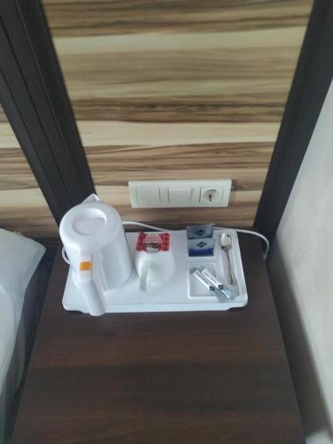 a small bathroom with a toilet in a room at VLG Hotel in Boryspilʼ