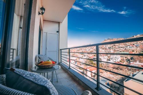 En balkon eller terrasse på Comfy Apartment