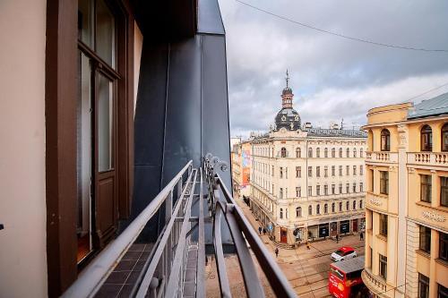 a view of a city from a balcony of a building at Residential Barona Apartments in Riga Centre in Rīga
