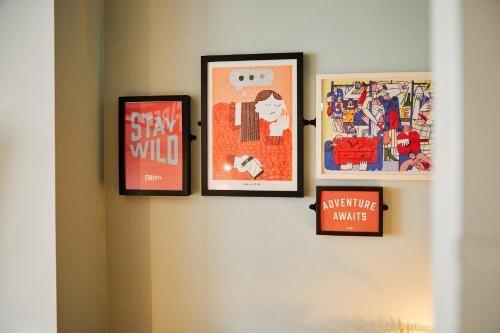 three framed pictures hanging on a wall at Firefly in Bray
