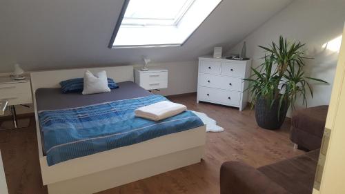 Giường trong phòng chung tại Ferienwohnung Antonia