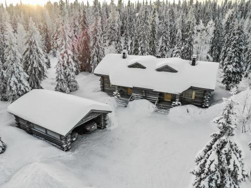 an aerial view of a cabin covered in snow at Holiday Home Kuruhovi b by Interhome in Ruka