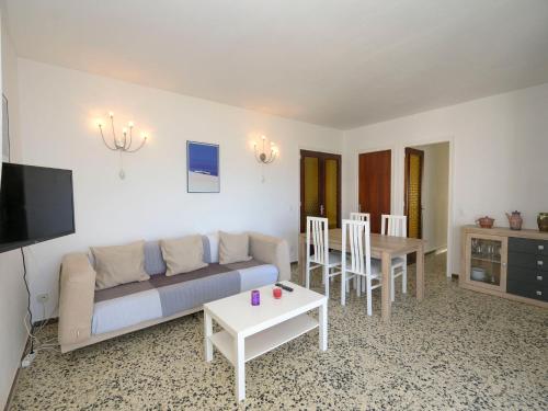 A seating area at Apartment Costa Playa by Interhome