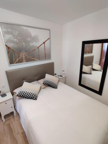Ένα ή περισσότερα κρεβάτια σε δωμάτιο στο Apartamento Playa Quemada Lanzarote