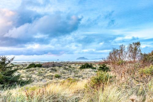a view of the desert under a cloudy sky at Whalerock Luxury Home in Trinidad