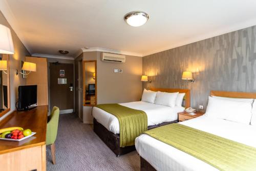 Postel nebo postele na pokoji v ubytování Holiday Inn A55 Chester West by IHG