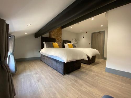 a bedroom with a large bed in a room at 6Adelphi in Preston
