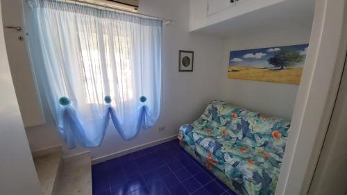 Ein Bett oder Betten in einem Zimmer der Unterkunft un angolo di paradiso
