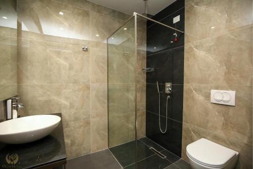 Koupelna v ubytování Hotel Olive