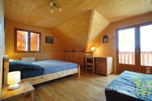 Ένα ή περισσότερα κρεβάτια σε δωμάτιο στο Chalet de Solène