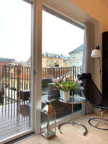 En balkon eller terrasse på ApartmentInCopenhagen Apartment 1440