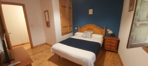 A bed or beds in a room at Ablanera 2