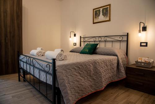 Ένα ή περισσότερα κρεβάτια σε δωμάτιο στο Agriturismo alla Solagna