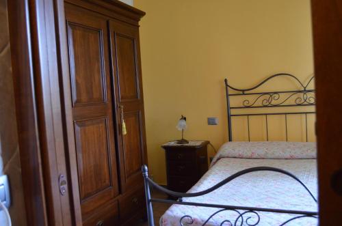 Ένα ή περισσότερα κρεβάτια σε δωμάτιο στο Agriturismo da Pudech