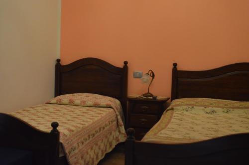Ένα ή περισσότερα κρεβάτια σε δωμάτιο στο Agriturismo da Pudech