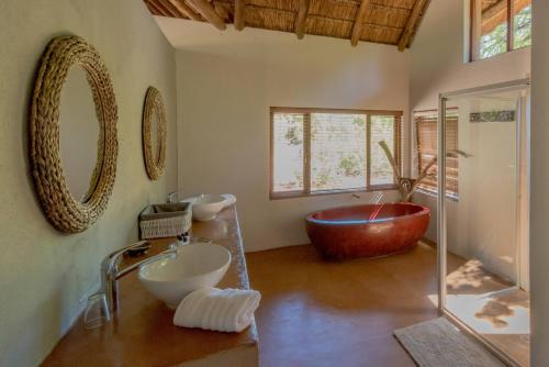 Ванная комната в Pilanesberg Private Lodge