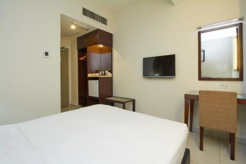 Kepong Hotel 객실 침대