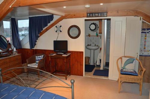 A television and/or entertainment center at Captains Cabin 