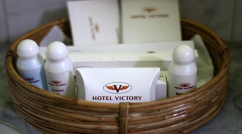 a basket with products in it on a table at Hotel Victory - Best in City Center in Dhaka