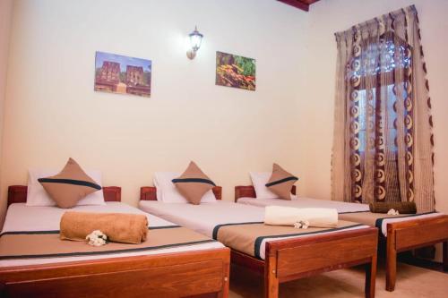 Krevet ili kreveti u jedinici u objektu 4ty two Homestay Galle