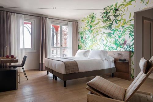 Postel nebo postele na pokoji v ubytování QC Room San Pellegrino