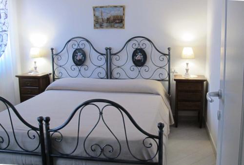 מיטה או מיטות בחדר ב-Casa Padoan