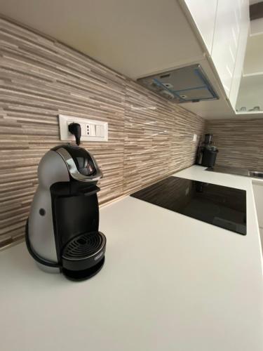 a coffee maker sitting on a kitchen counter at Greta's House Pizzo in Pizzo