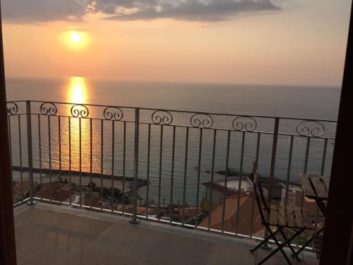 a sunset from the balcony of a condo at Greta's House Pizzo in Pizzo