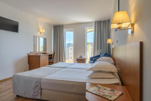 Letto o letti in una camera di Madara Park Hotel - All Inclusive or BB
