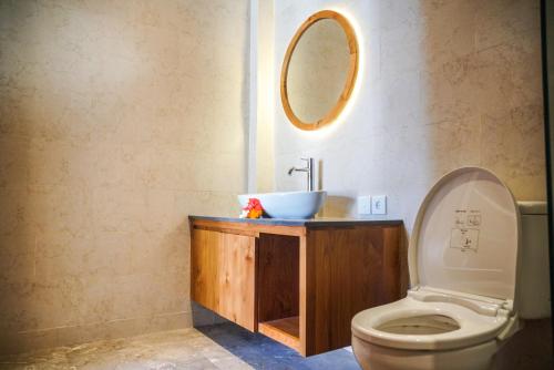 A bathroom at Bisma Terrace Suite Ubud