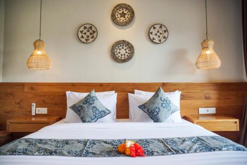 Cama o camas de una habitación en Bisma Terrace Suite Ubud