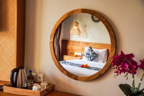 Cama o camas de una habitación en Bisma Terrace Suite Ubud