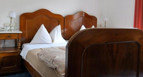 Postelja oz. postelje v sobi nastanitve Hotel Baur Am See
