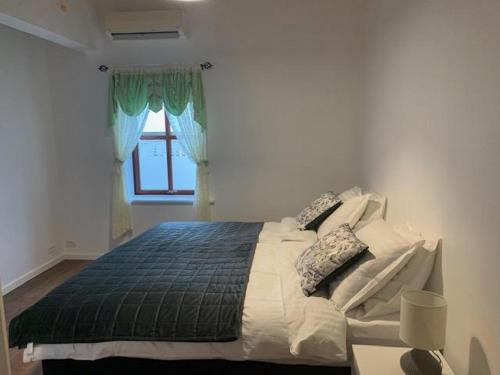 Posteľ alebo postele v izbe v ubytovaní Thor´s Guest house