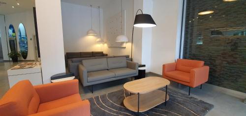 Ein Sitzbereich in der Unterkunft Hotel Gran Ultonia