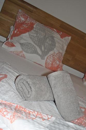 a pair of socks laying on a bed at Ferienwohnung Fam. Bidner in Flattach