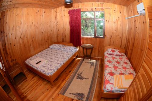 Llit o llits en una habitació de Olympos Camlık Pension